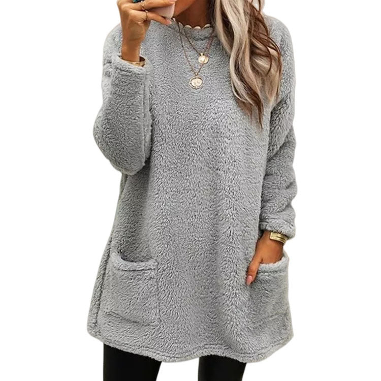Damer Mysig fleece-tröja med moderiktig rundhalsringning och praktiska fickor Mirla-Eva Jonsson
