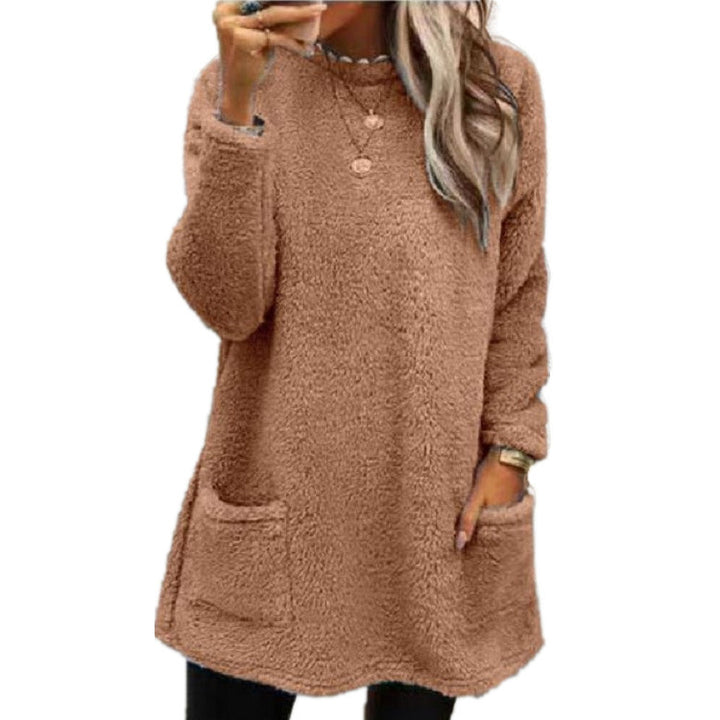 Damer Mysig fleece-tröja med moderiktig rundhalsringning och praktiska fickor Mirla-Eva Jonsson
