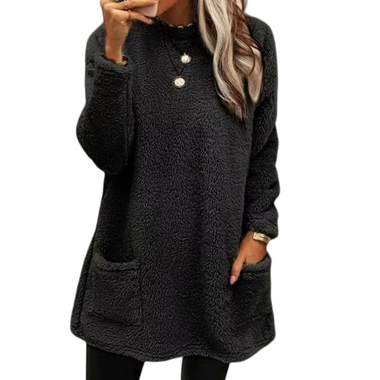 Damer Mysig fleece-tröja med moderiktig rundhalsringning och praktiska fickor Mirla-Eva Jonsson