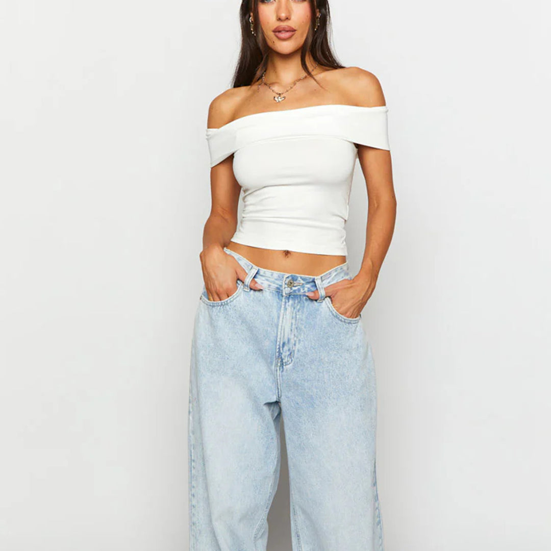 Damer Off-Shoulder Crop-Top i elastiskt material med figursmickrande design Mirla-Eva Jonsson
