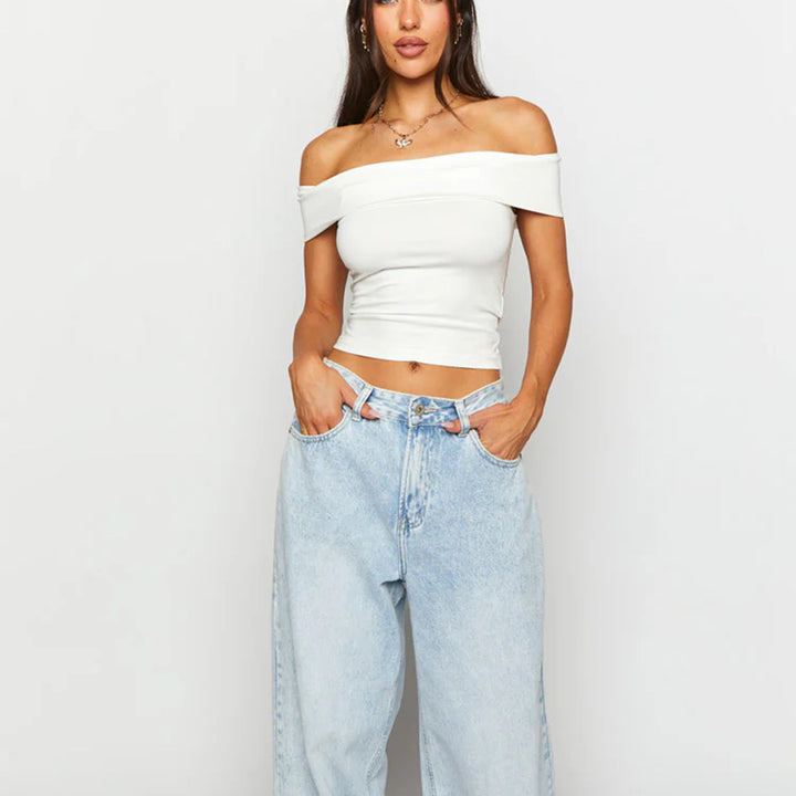 Damer Off-Shoulder Crop-Top i elastiskt material med figursmickrande design Mirla-Eva Jonsson