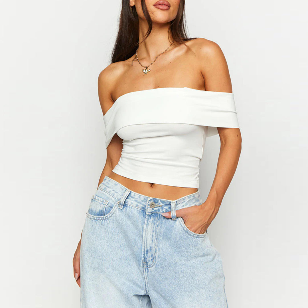 Damer Off-Shoulder Crop-Top i elastiskt material med figursmickrande design Mirla-Eva Jonsson