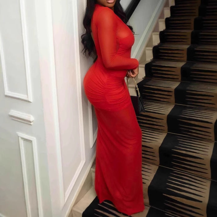 Damer Off-Shoulder Maxiklänning med transparenta accenter och svängande fåll Mirla-Eva Jonsson