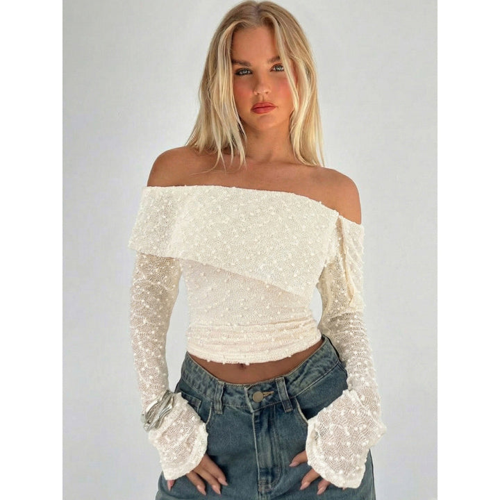 Damer Off-Shoulder Top med eleganta volangdetaljer och långa ärmar Mirla-Eva Jonsson