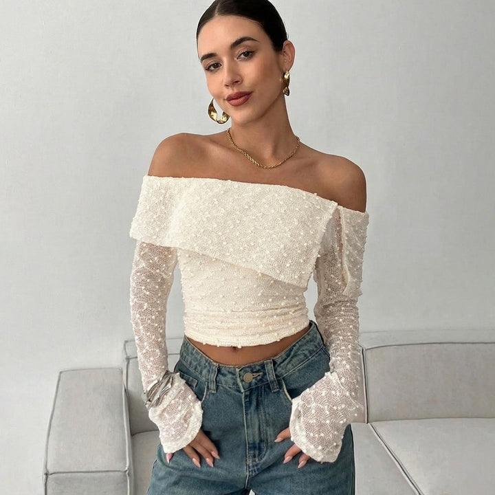 Damer Off-Shoulder Top med eleganta volangdetaljer och långa ärmar Mirla-Eva Jonsson