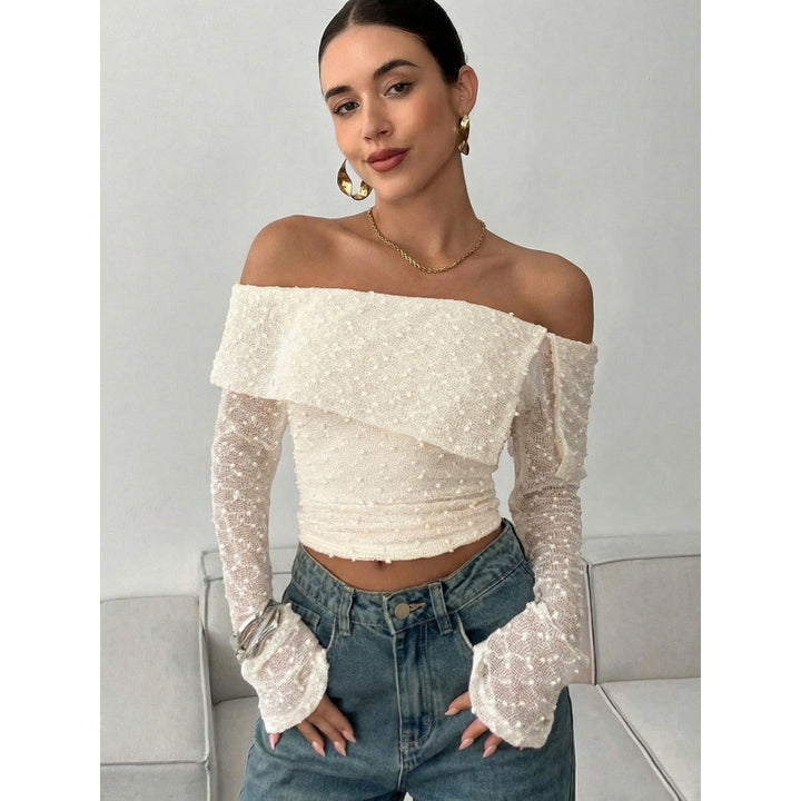 Damer Off-Shoulder Top med eleganta volangdetaljer och långa ärmar Mirla-Eva Jonsson