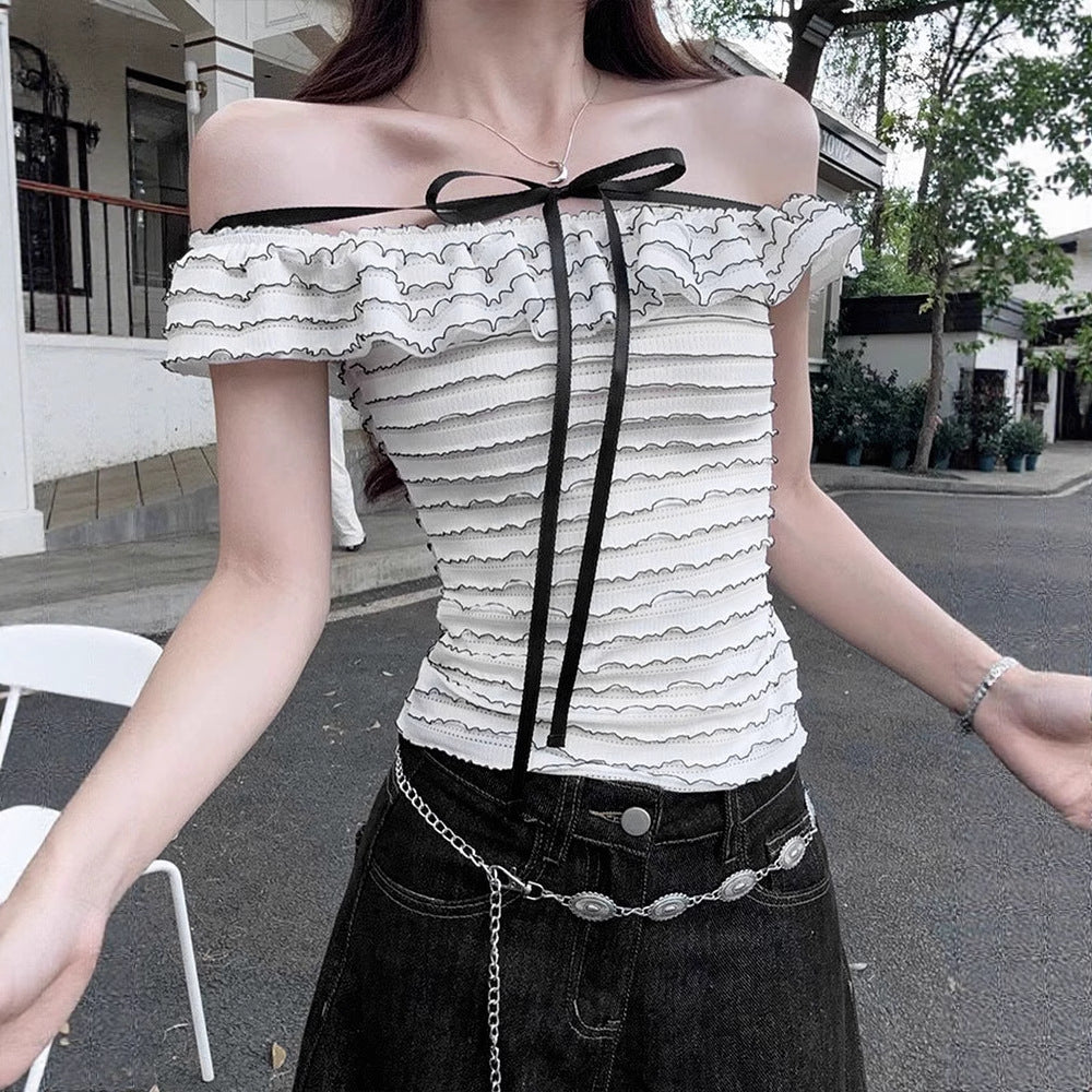 Damer Offshoulder-blus med elegant vågmönster Mirla-Eva Jonsson