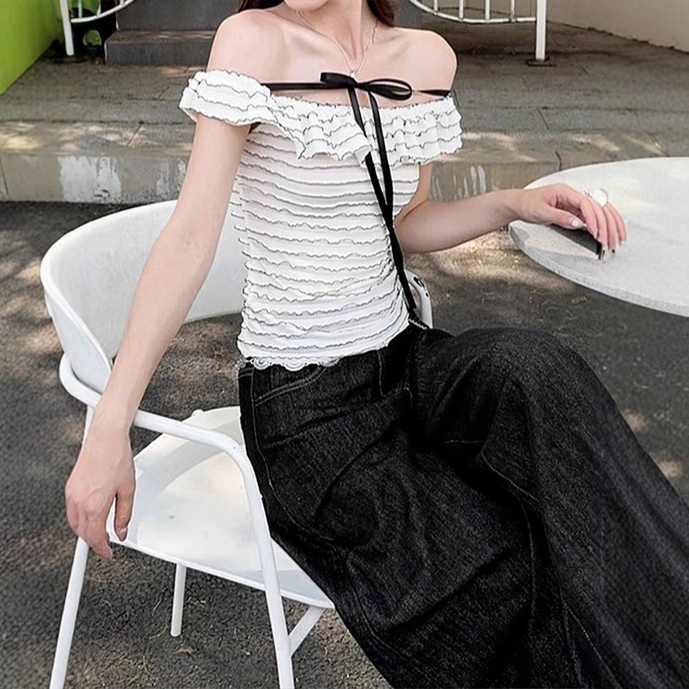 Damer Offshoulder-blus med elegant vågmönster Mirla-Eva Jonsson