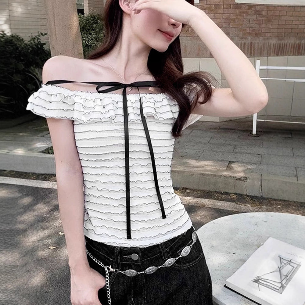 Damer Offshoulder-blus med elegant vågmönster Mirla-Eva Jonsson