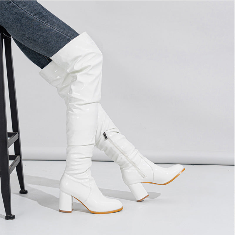 Damer Overknee-stövlar med modernt veckdesign och glänsande finish Mirla-Eva Jonsson