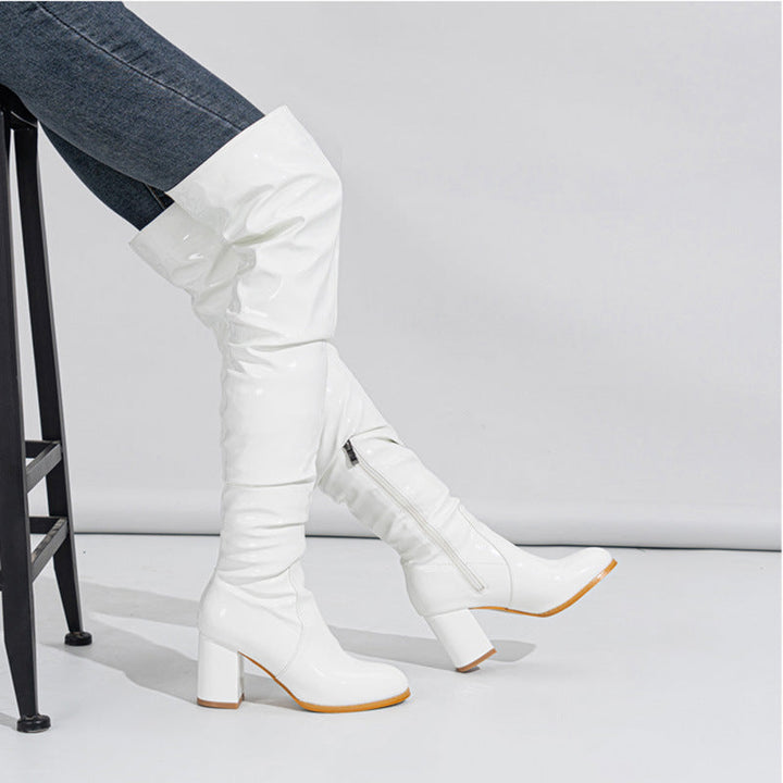 Damer Overknee-stövlar med modernt veckdesign och glänsande finish Mirla-Eva Jonsson
