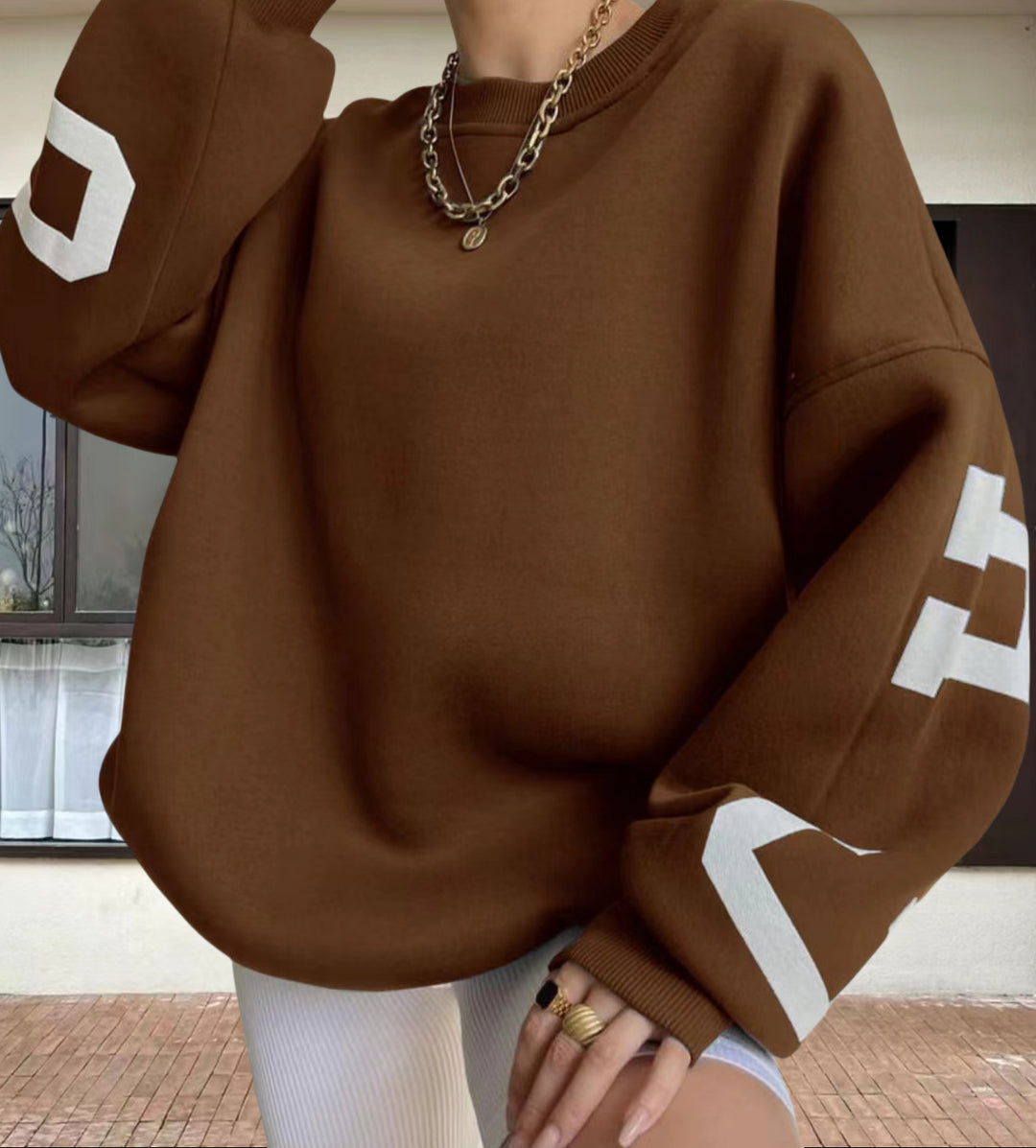 Damer Oversize Sweatshirt med grafiska accenter Mirla-Eva Jonsson