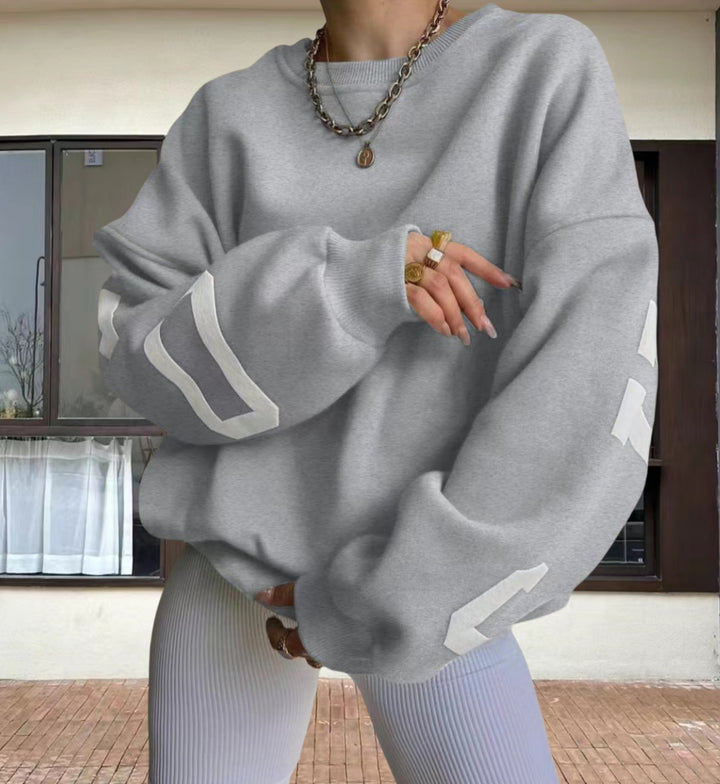 Damer Oversize Sweatshirt med grafiska accenter Mirla-Eva Jonsson