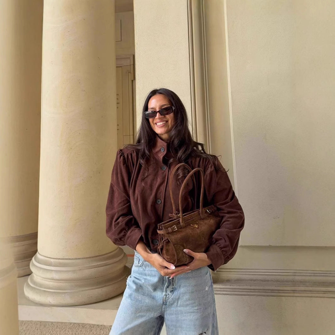 Damer Oversized Blus med stiligt plisserad design och eleganta knapppdetaljer Mirla-Eva Jonsson