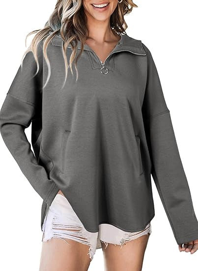 Damer Oversized Fritidströja med halvmångdragkedja och praktiska fickor Mirla-Eva Jonsson