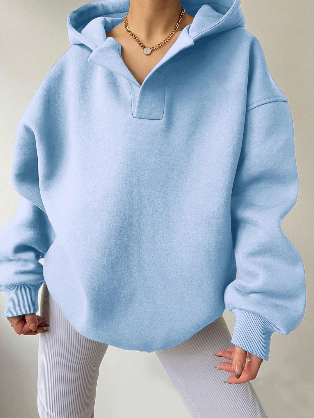 Damer Oversized Hoodie med Polokrage från Mirla-Eva Jonsson