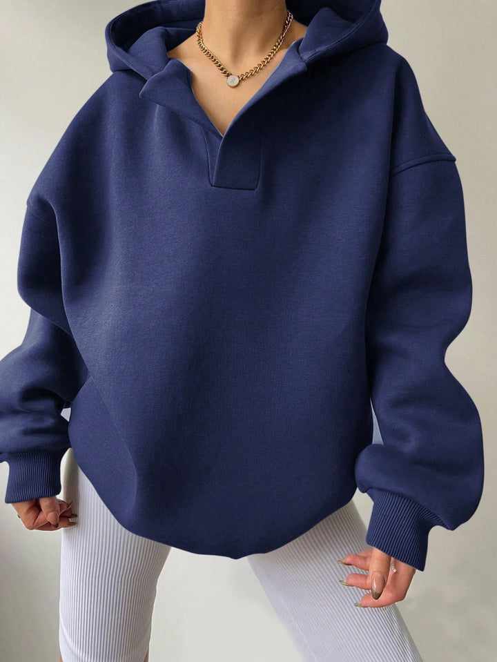 Damer Oversized Hoodie med Polokrage från Mirla-Eva Jonsson