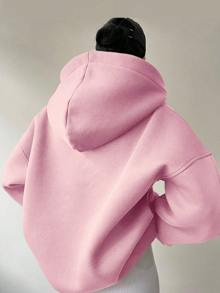 Damer Oversized Hoodie med Polokrage från Mirla-Eva Jonsson