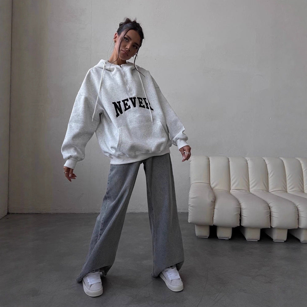 Damer Oversized Hoodie med dragkedja och statement-tryck Mirla-Eva Jonsson