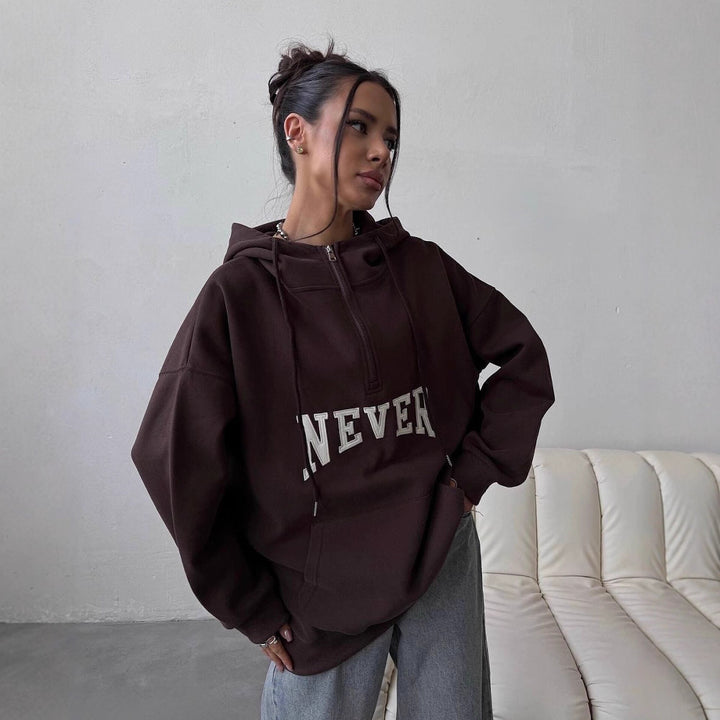Damer Oversized Hoodie med dragkedja och statement-tryck Mirla-Eva Jonsson