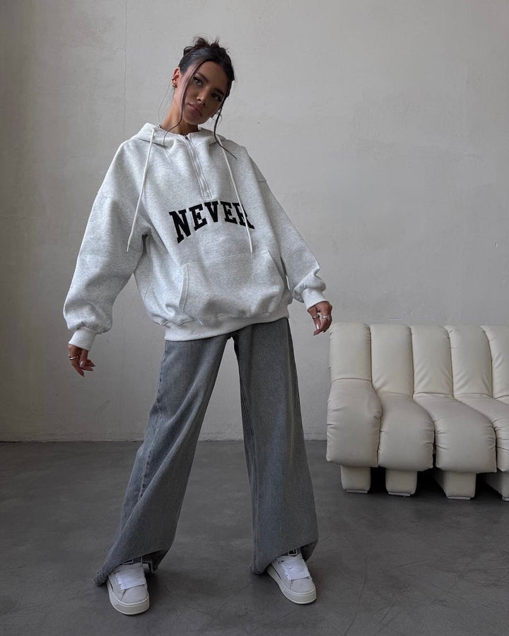 Damer Oversized Hoodie med dragkedja och statement-tryck Mirla-Eva Jonsson
