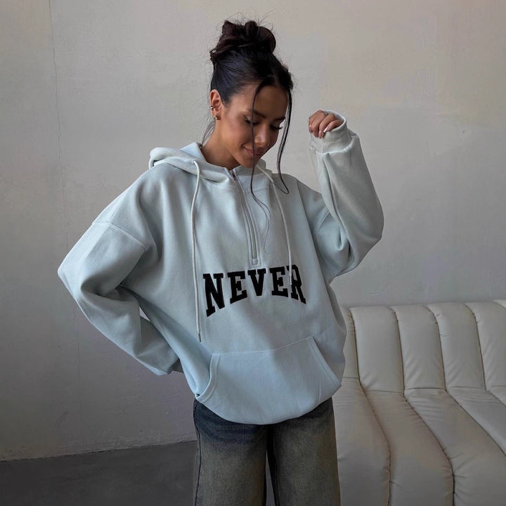 Damer Oversized Hoodie med dragkedja och statement-tryck Mirla-Eva Jonsson