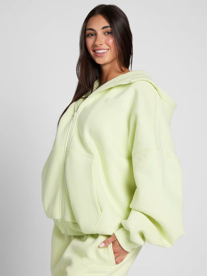 Damer Oversized Hoodiejacka med bekväm passform och djupa fickor Mirla-Eva Jonsson