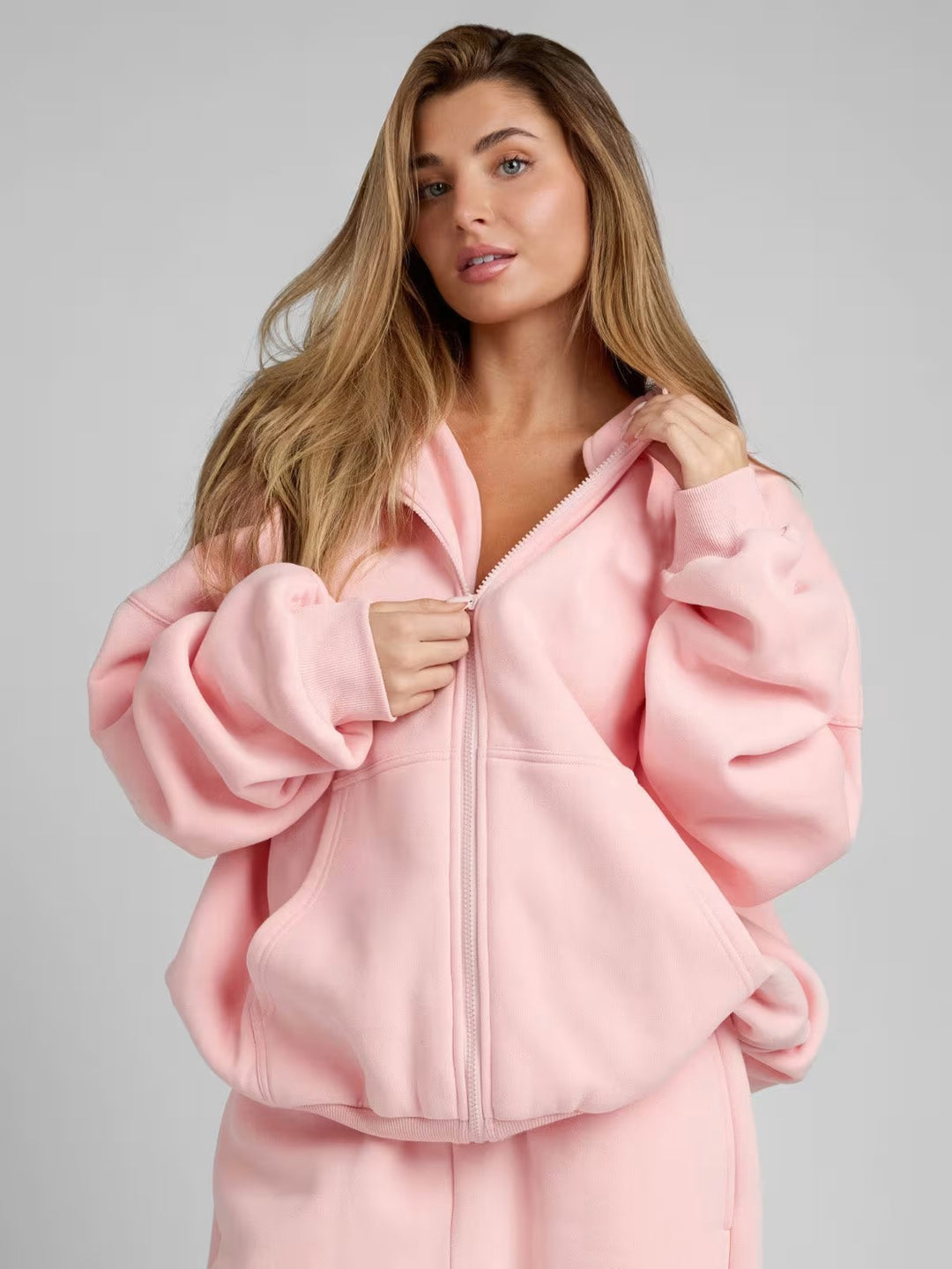 Damer Oversized Hoodiejacka med bekväm passform och djupa fickor Mirla-Eva Jonsson