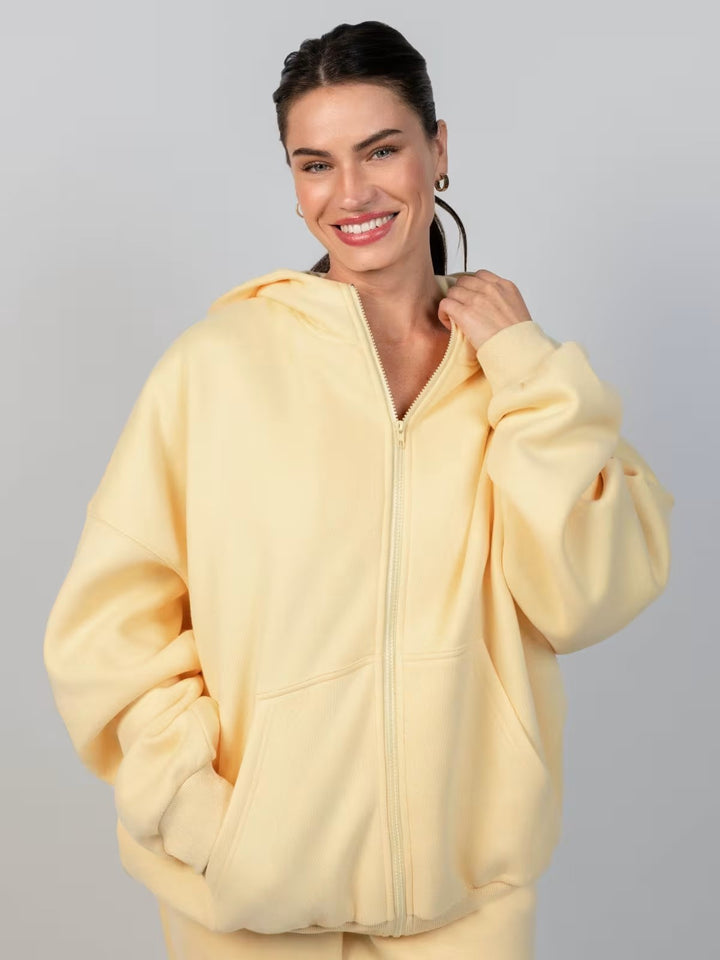 Damer Oversized Hoodiejacka med bekväm passform och djupa fickor Mirla-Eva Jonsson