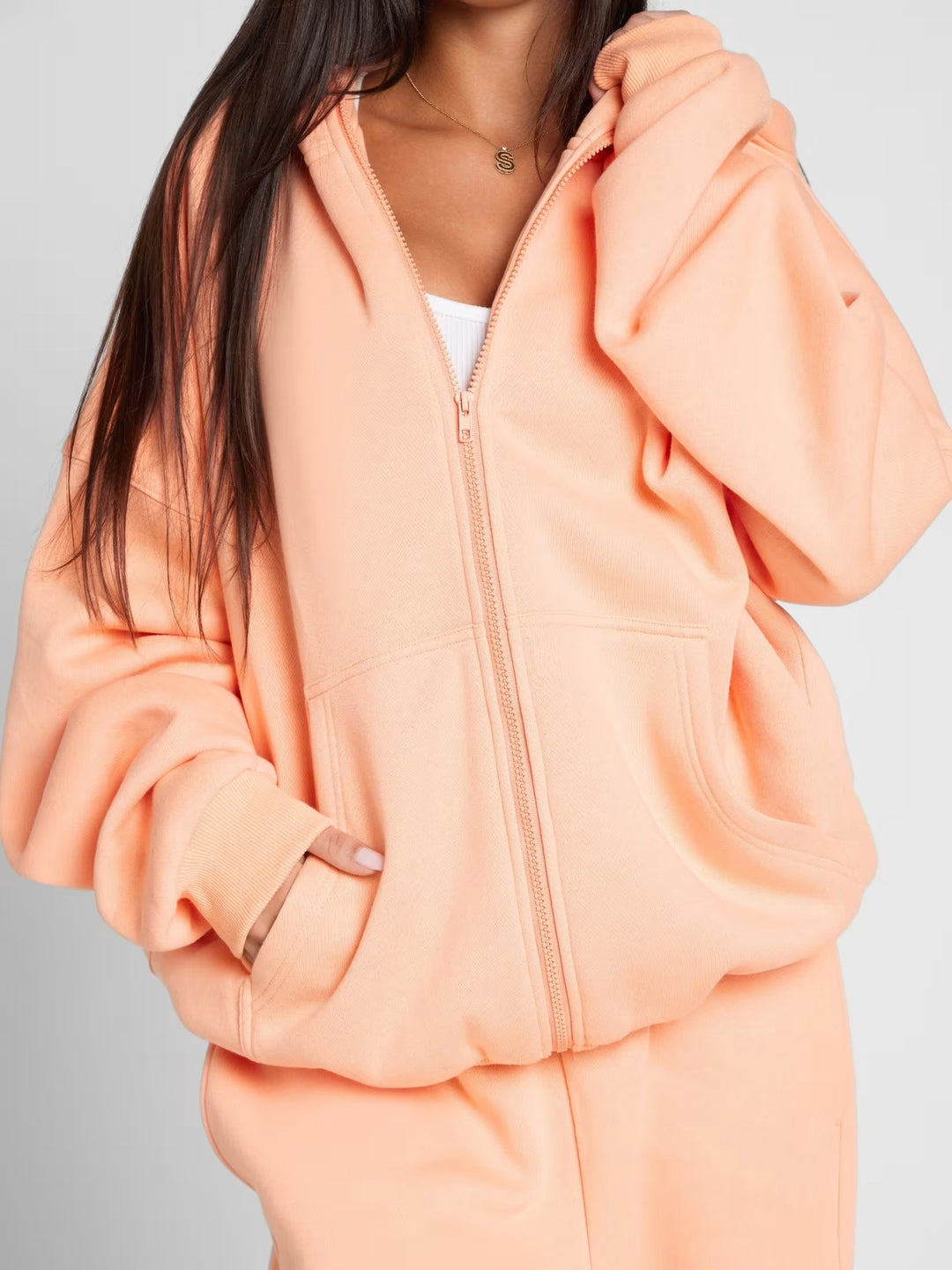 Damer Oversized Hoodiejacka med bekväm passform och djupa fickor Mirla-Eva Jonsson