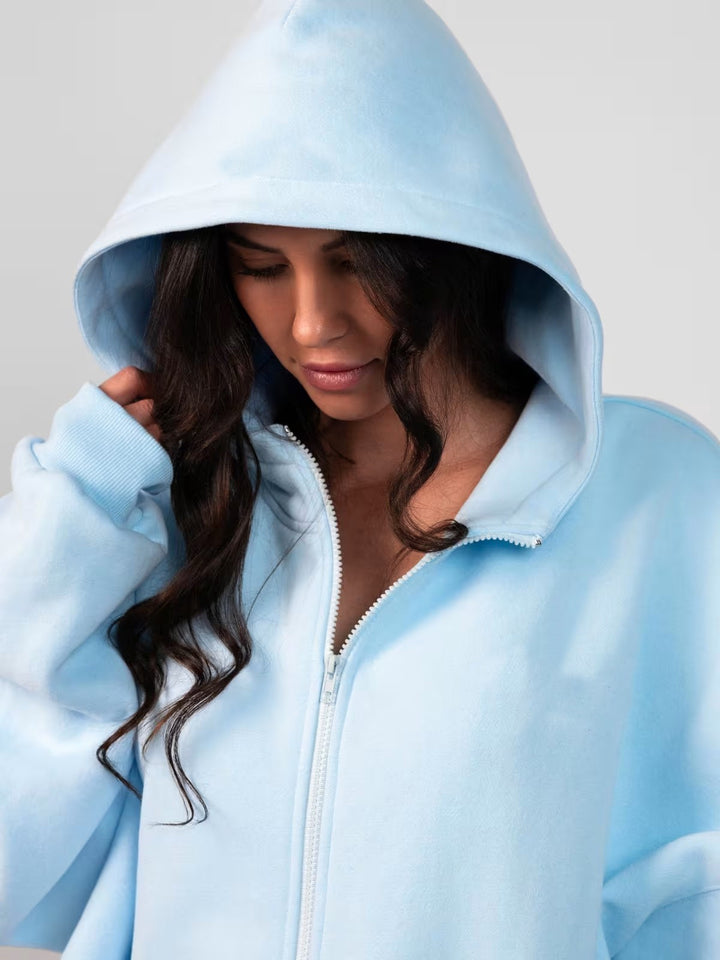 Damer Oversized Hoodiejacka med bekväm passform och djupa fickor Mirla-Eva Jonsson