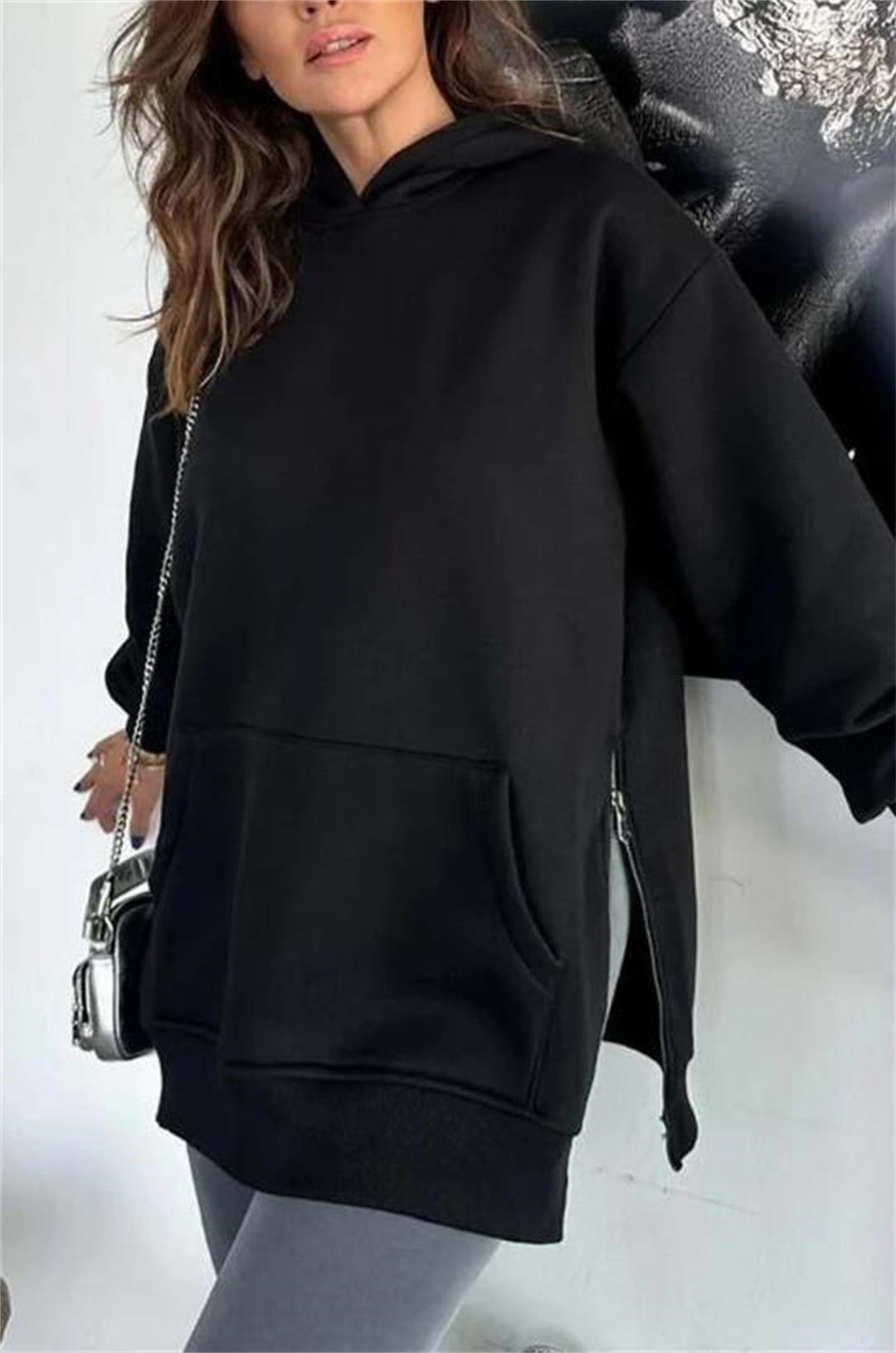 Damer Oversized Hoodietröja med sidodragkedjor och universell passform Mirla-Eva Jonsson