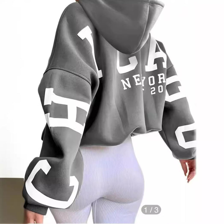 Damer Oversized Huva Sweater med stiligt tryck Mirla-Eva Jonsson