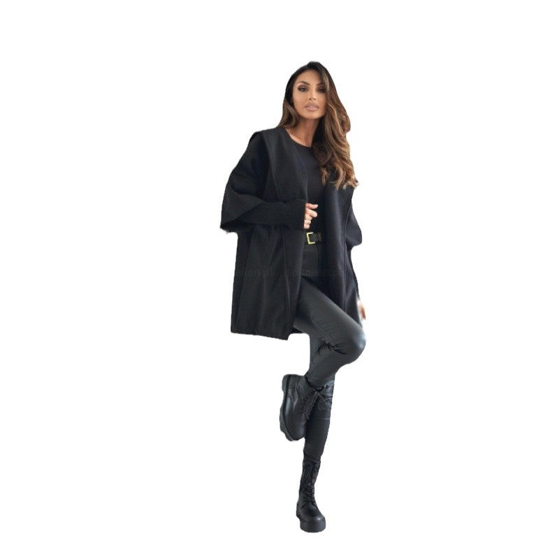 Damer Oversized Kappa med stiliga fickor och värmande foder Mirla-Eva Jonsson