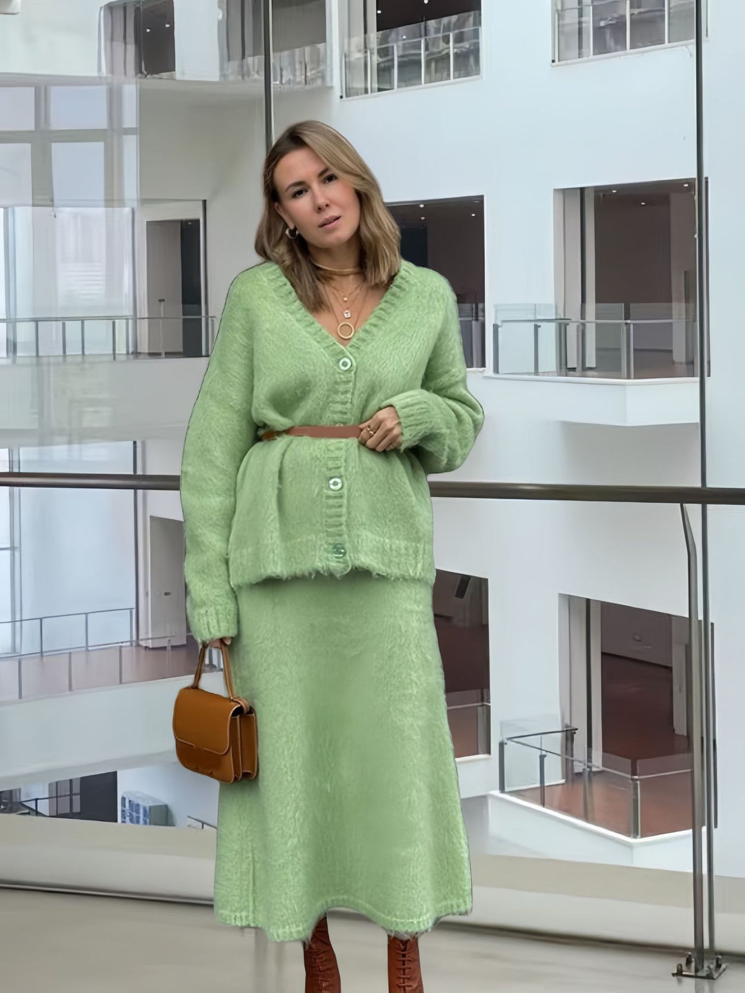 Damer Oversized Kofta med djup V-hals och stora knappar Mirla-Eva Jonsson