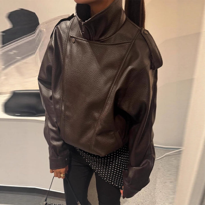 Damer Oversized Konstläderjacka med hög krage och voluminösa ärmar Mirla-Eva Jonsson