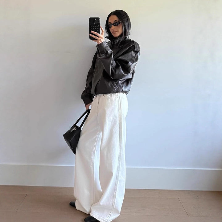 Damer Oversized Konstläderjacka med hög krage och voluminösa ärmar Mirla-Eva Jonsson