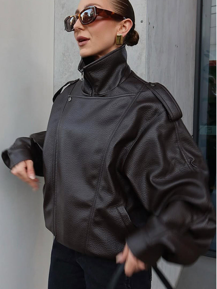 Damer Oversized Konstläderjacka med hög krage och voluminösa ärmar Mirla-Eva Jonsson