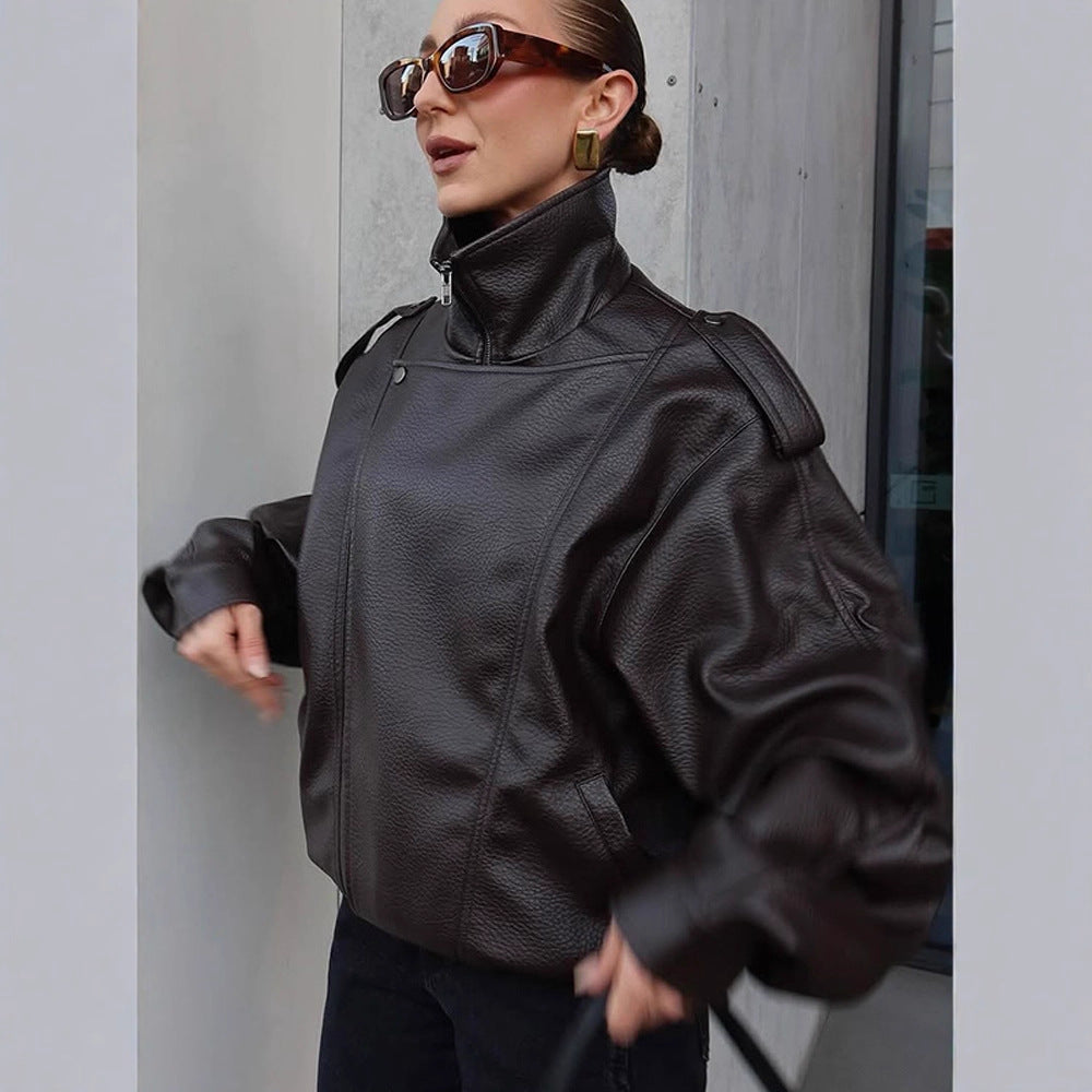 Damer Oversized Konstläderjacka med hög krage och voluminösa ärmar Mirla-Eva Jonsson