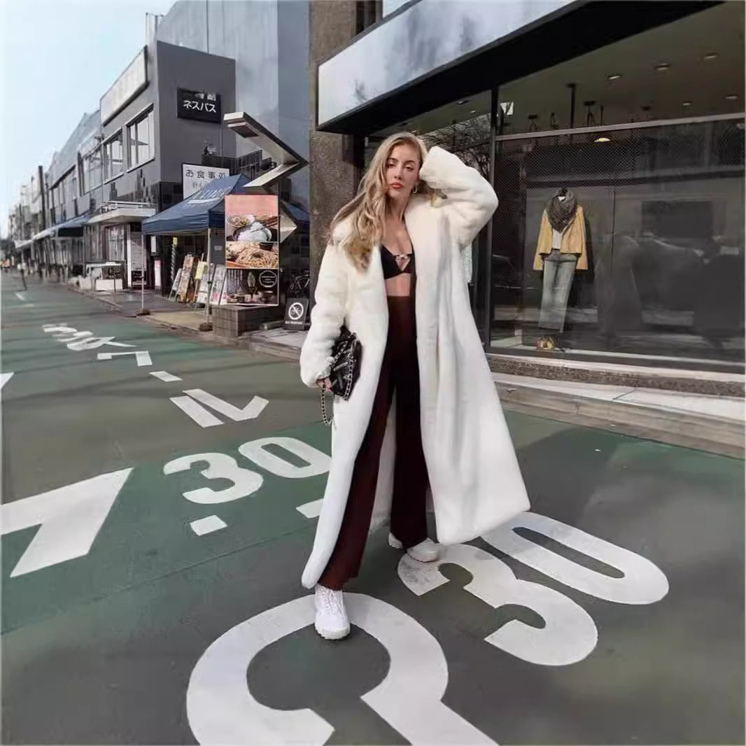 Damer Oversized Konstpälsjacka med huva och strukturerad design Mirla-Eva Jonsson