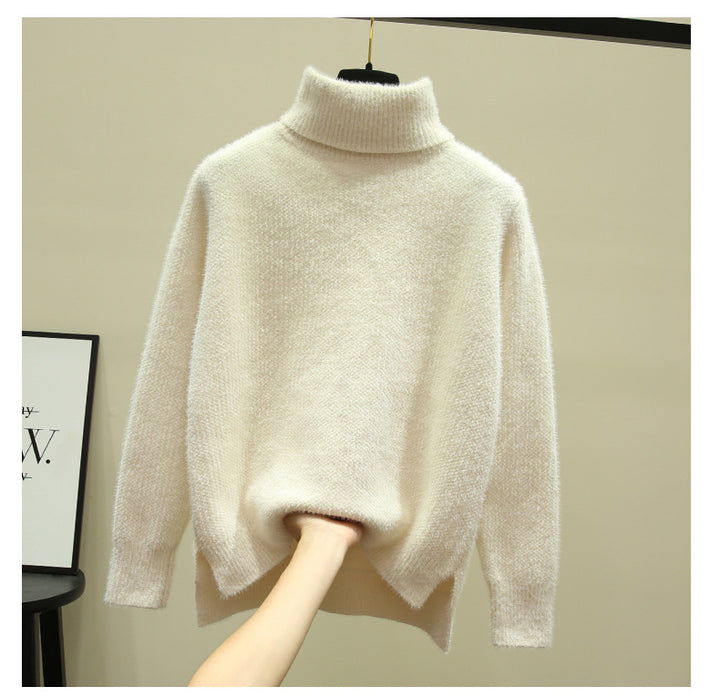 Damer Oversized Rullkragskofta i mjuk stickning Eva Jonsson-Eva Jonsson