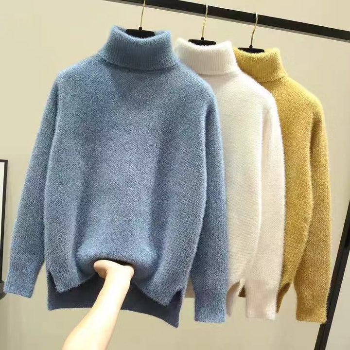 Damer Oversized Rullkragskofta i mjuk stickning Eva Jonsson-Eva Jonsson