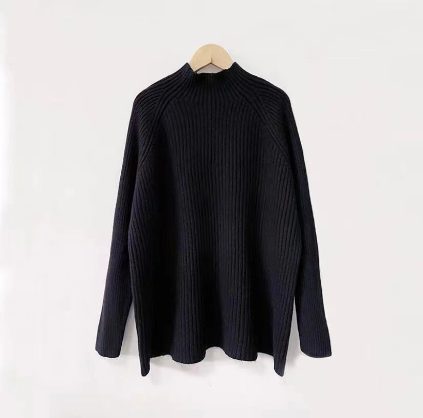 Damer Oversized Stickad Tröja med Rullkrage och Fin Ribbad Design Mirla-Eva Jonsson