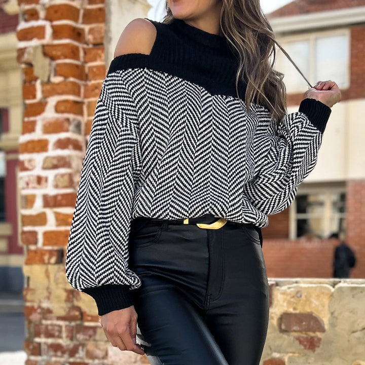 Damer Oversized Stickad Tröja med djup Halsringning och off-shoulder Design Mirla-Eva Jonsson