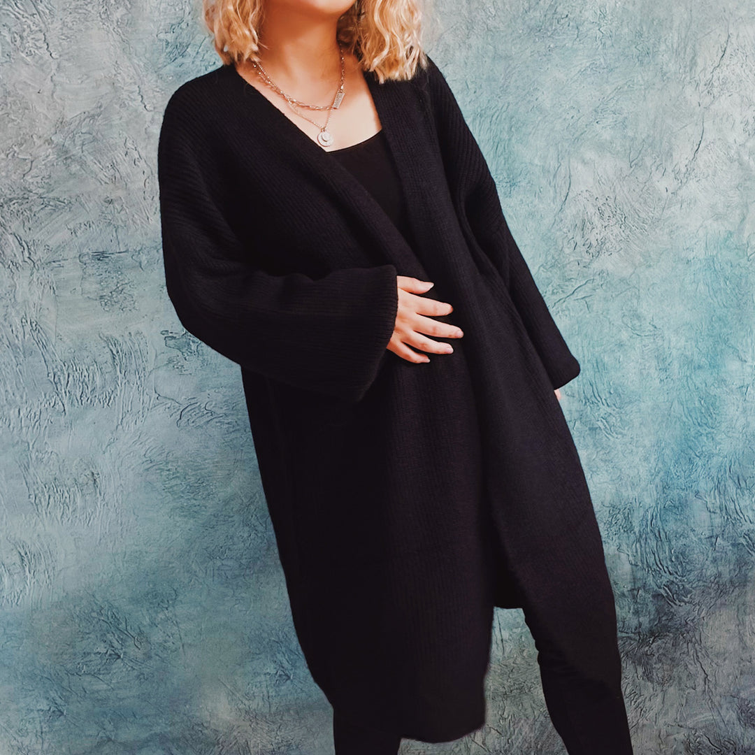 Damer Oversized Stickad jacka med djup V-hals och avslappnad passform Eva Jonsson-Eva Jonsson