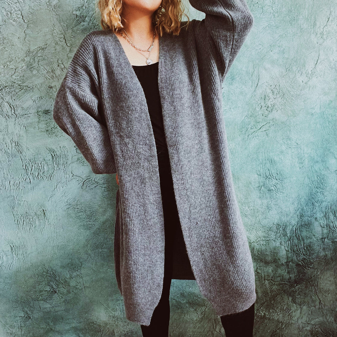Damer Oversized Stickad jacka med djup V-hals och avslappnad passform Eva Jonsson-Eva Jonsson