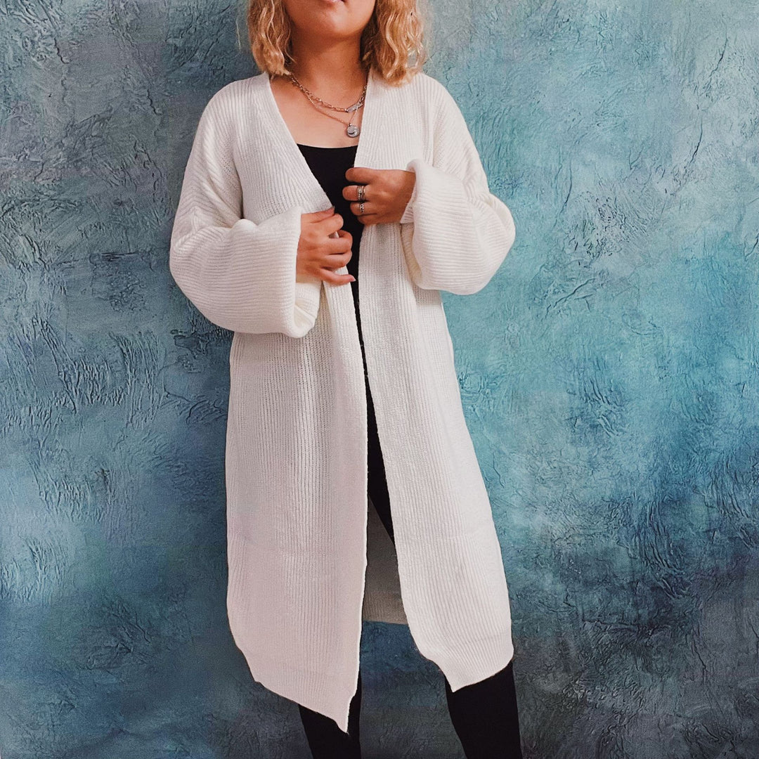 Damer Oversized Stickad jacka med djup V-hals och avslappnad passform Eva Jonsson-Eva Jonsson