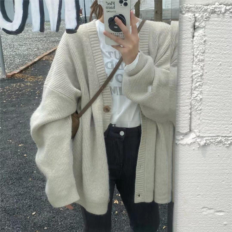 Damer Oversized Stickad jacka med mjuka ärmar och knäppning Mirla-Eva Jonsson