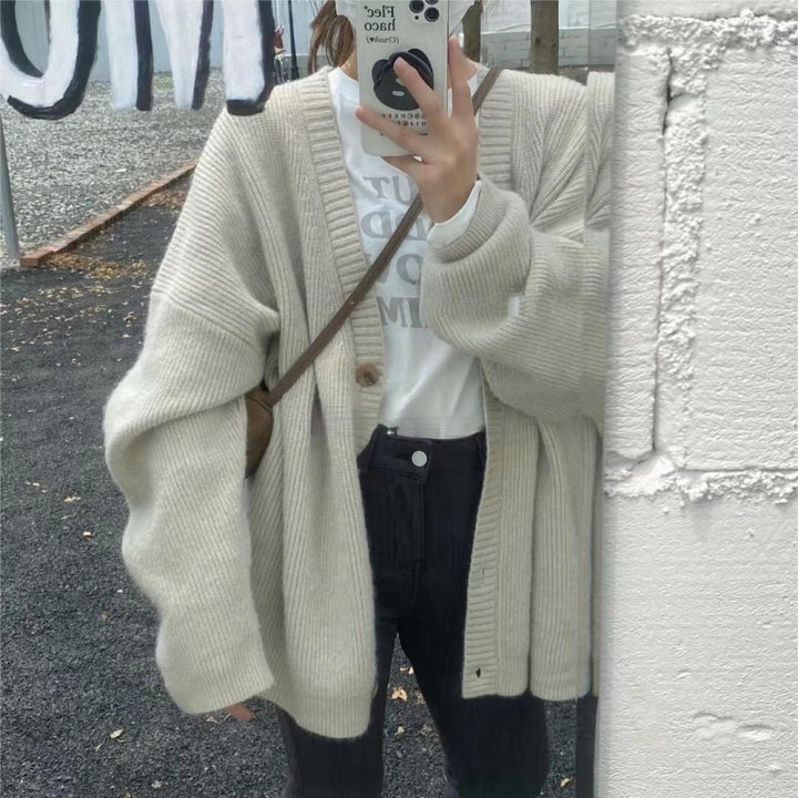 Damer Oversized Stickad jacka med mjuka ärmar och knäppning Mirla-Eva Jonsson