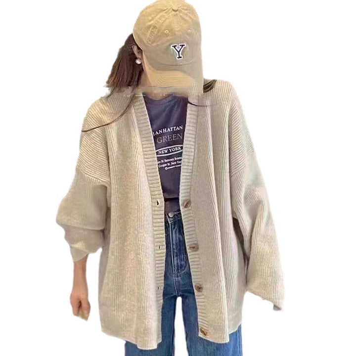 Damer Oversized Stickad jacka med mjuka ärmar och knäppning Mirla-Eva Jonsson